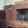 Brick Fireplace and raised hearth with log storage