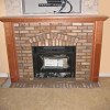 Brick Fireplace and hearth - custom wood mantel and surround