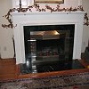 Black Marble Face Fireplace and hearth - custom wood mantel and surround