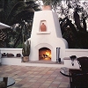 Custom Masonry Stucco Outdoor Chimney and Rumford Style Fireplace