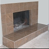 Granite Tile Face Fireplace and raised hearth