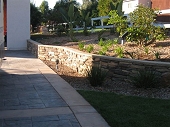 Custom masonry eldorado veneer stone wall