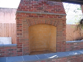 Custom masonry outdoor rumford brick fireplace