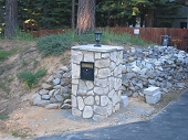 Custom masonry stone column with mailbox
