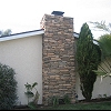 Custom Masonry Stone Chimney - Eldorado Stone veneer