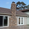 Custom Masonry Stone Chimney - Eldorado Stone veneer