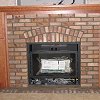 Brick Fireplace and hearth - custom wood mantel and surround