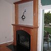 Black Marble Face Fireplace and hearth - custom floor to ceiling wood mantel and surround