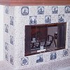 Custom Masonry Stone Tile Fireplace and raised hearth - inlaid Dutch theme decorative tiles - custom wood mantel and high shelf