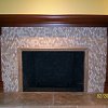 Mosaic Tile Face Fireplace with travertine tiled raised hearth - custom wood mantel and surround
