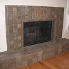 Batchelder Tile Face Fireplace and raised hearth